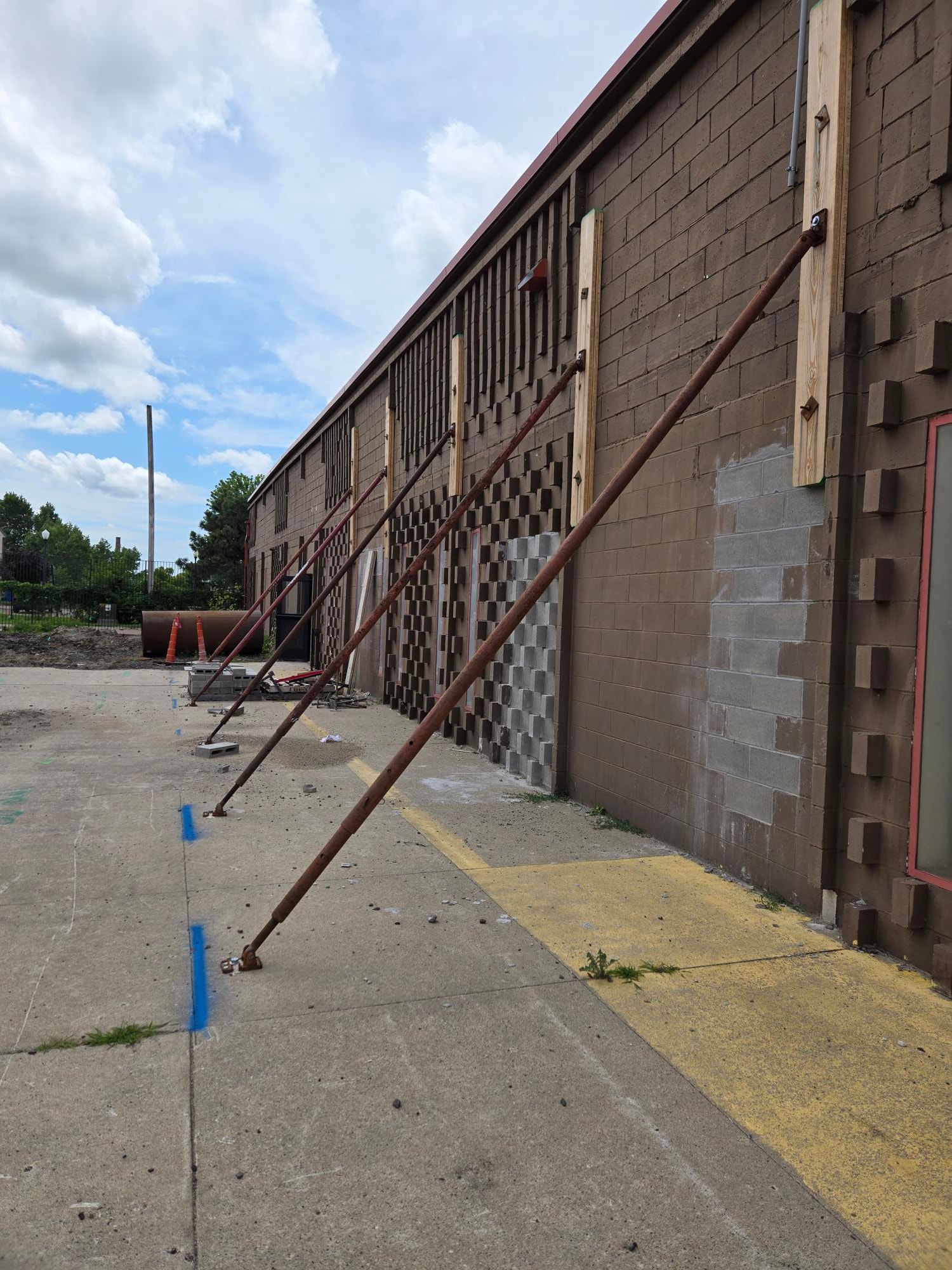 Tilt-up shoring supporting wall panels on a construction site