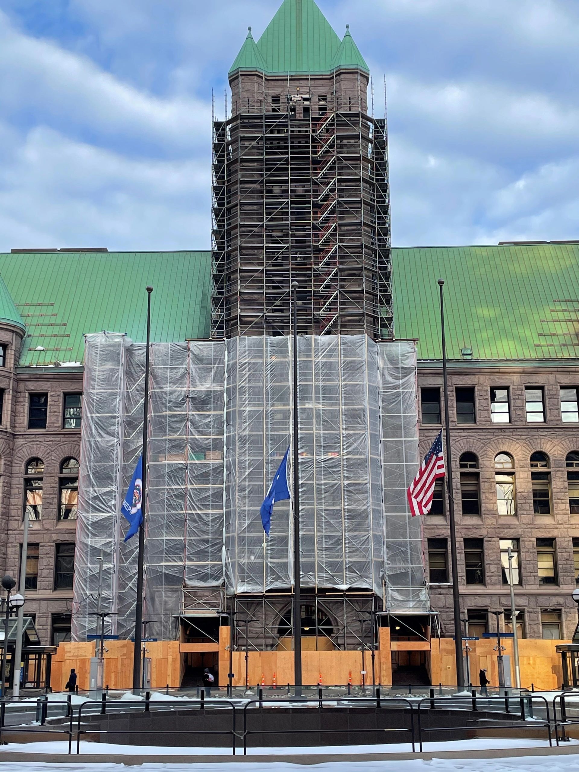 Poly scaffold enclosure providing weather protection on a construction site