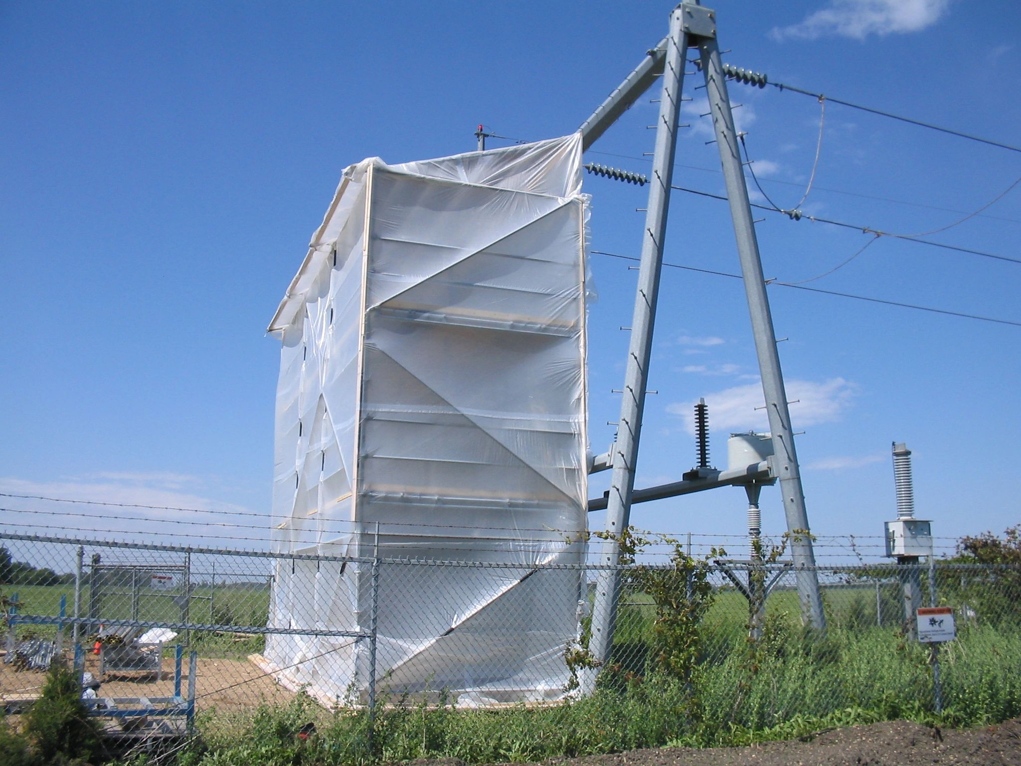 Scaffold enclosure at EHV Power industrial construction site